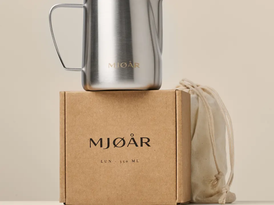 LUN in Steel on its cardboard box, next to the cotton bag